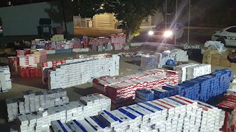 סיגריות מזויפות ומוברחות בכפר ברטעה, צילום: דוברות המשטרה